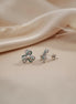 Trinity pearl ribbon studs