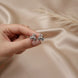 Trinity pearl ribbon studs